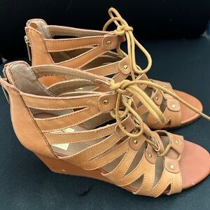 Size 8 lace up wedges. Only used once.
